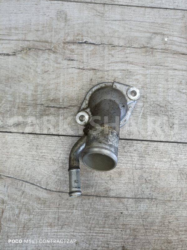 Крышка термостата Nissan X-Trail II (2007—2011) Nissan X-Trail оригинальный номер 13049JA00A