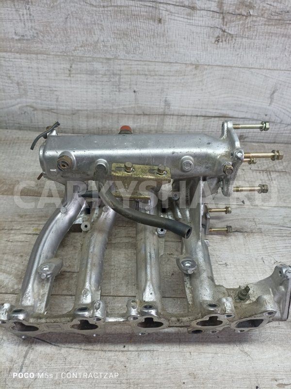 Коллектор впускной Mitsubishi Lancer VII (1995—2000) Mitsubishi i оригинальный номер MD350027