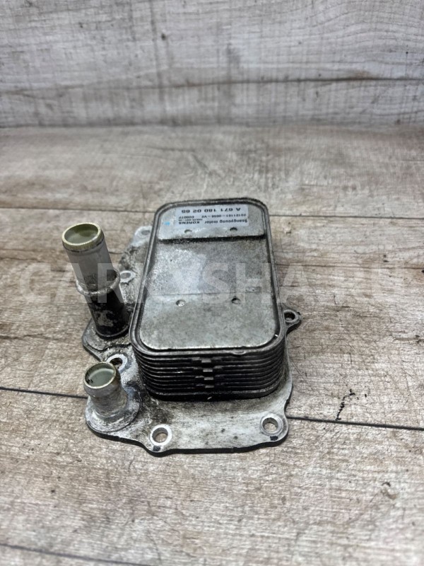 Радиатор масляный Ssang Yong Actyon new D20DTF Ssang Yong Actyon оригинальный номер A6711800265
