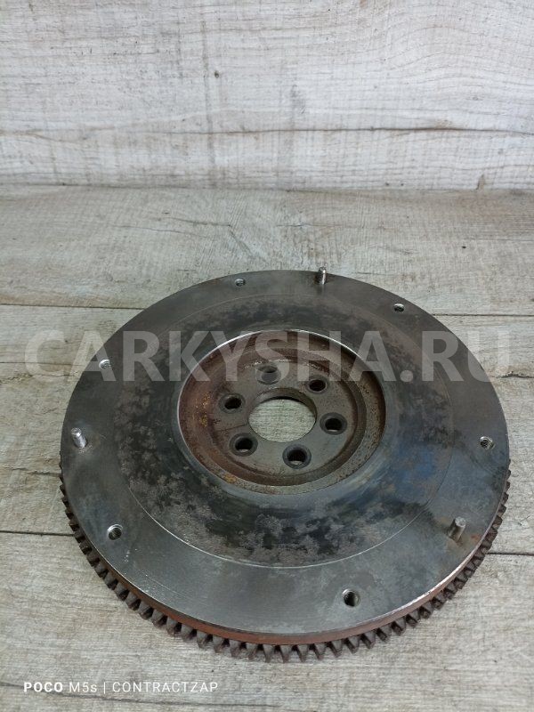 Маховик МКПП Nissan Almera N16 рестайлинг (2002—2006) Nissan Almera оригинальный номер 12311bm500