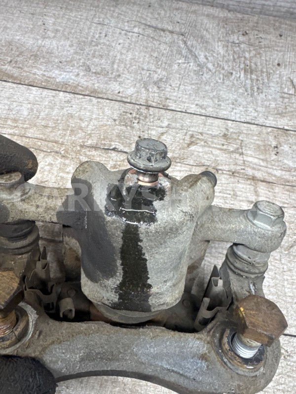 Задний суппорт левый  SsangYong Actyon New Ssang Yong Actyon оригинальный номер Bc140057