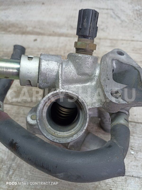 Корпус термостата Mitsubishi Lancer VII (1995—2000) Mitsubishi i оригинальный номер MN119504